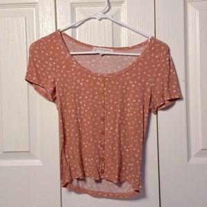 Junior womens salmon floral button up shirt.